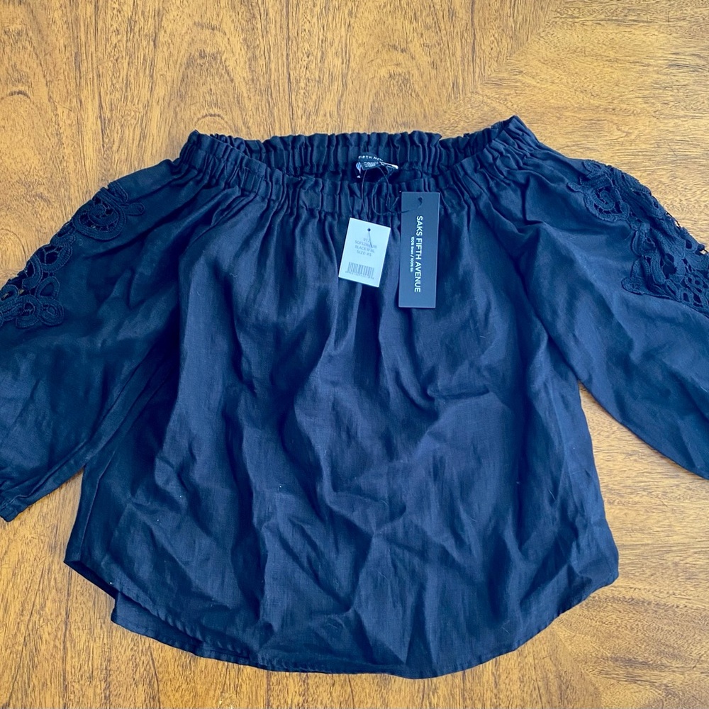 Saks black linen top with crochet detailing on the sleeves. Size XS and fits TTS
